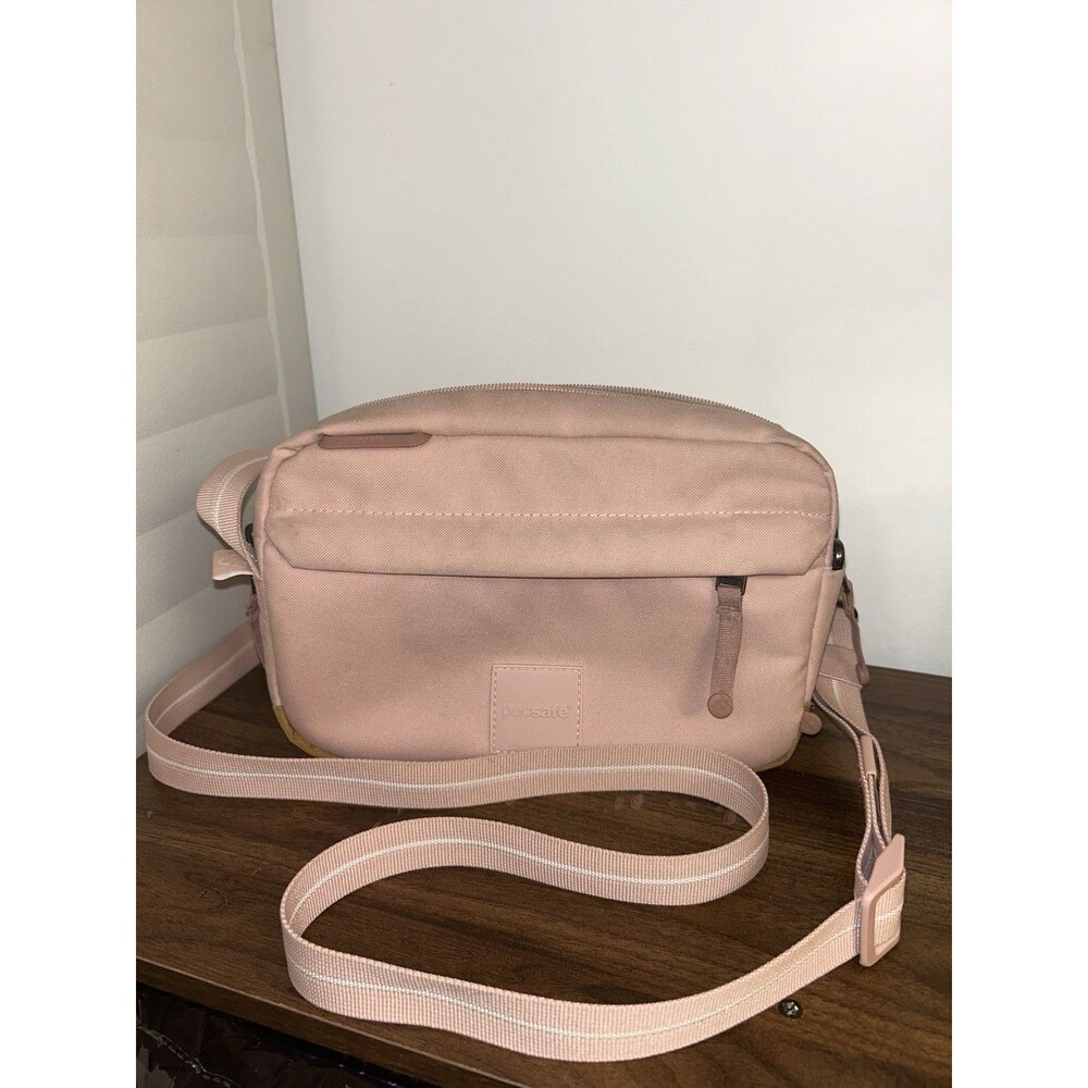 Pacsafe GO Anti-Theft Pink Solid Crossbody Bag Zip Closure Cross-Body Strap